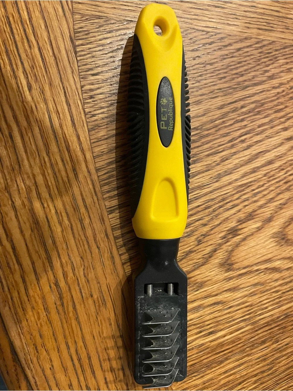 FURminator Yellow and Black Deshedding Tool with Blue-Accented Nail Clippers